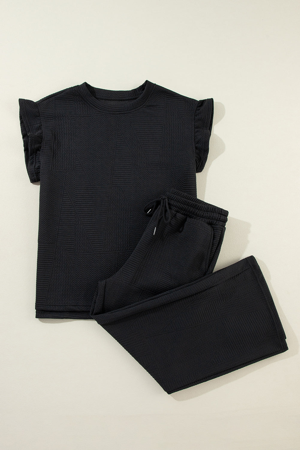 Set aus Oberteil und Hose mit Rüschen in Schwarz/Grün/Blau