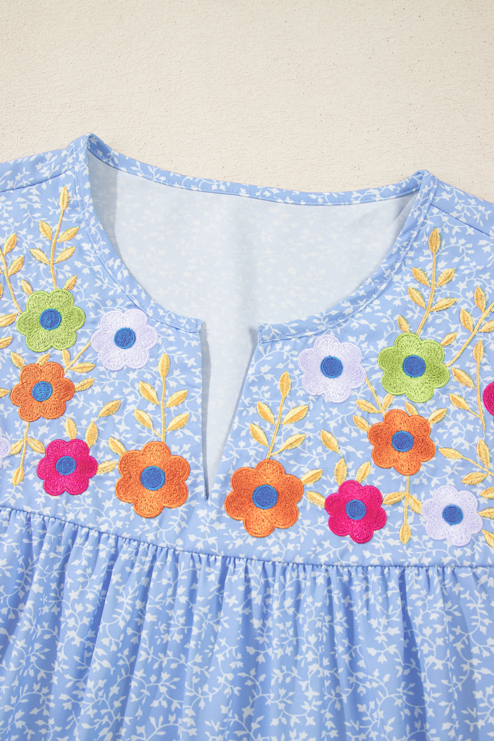 Blue Floral Embroidered Notched V Neck Blouse