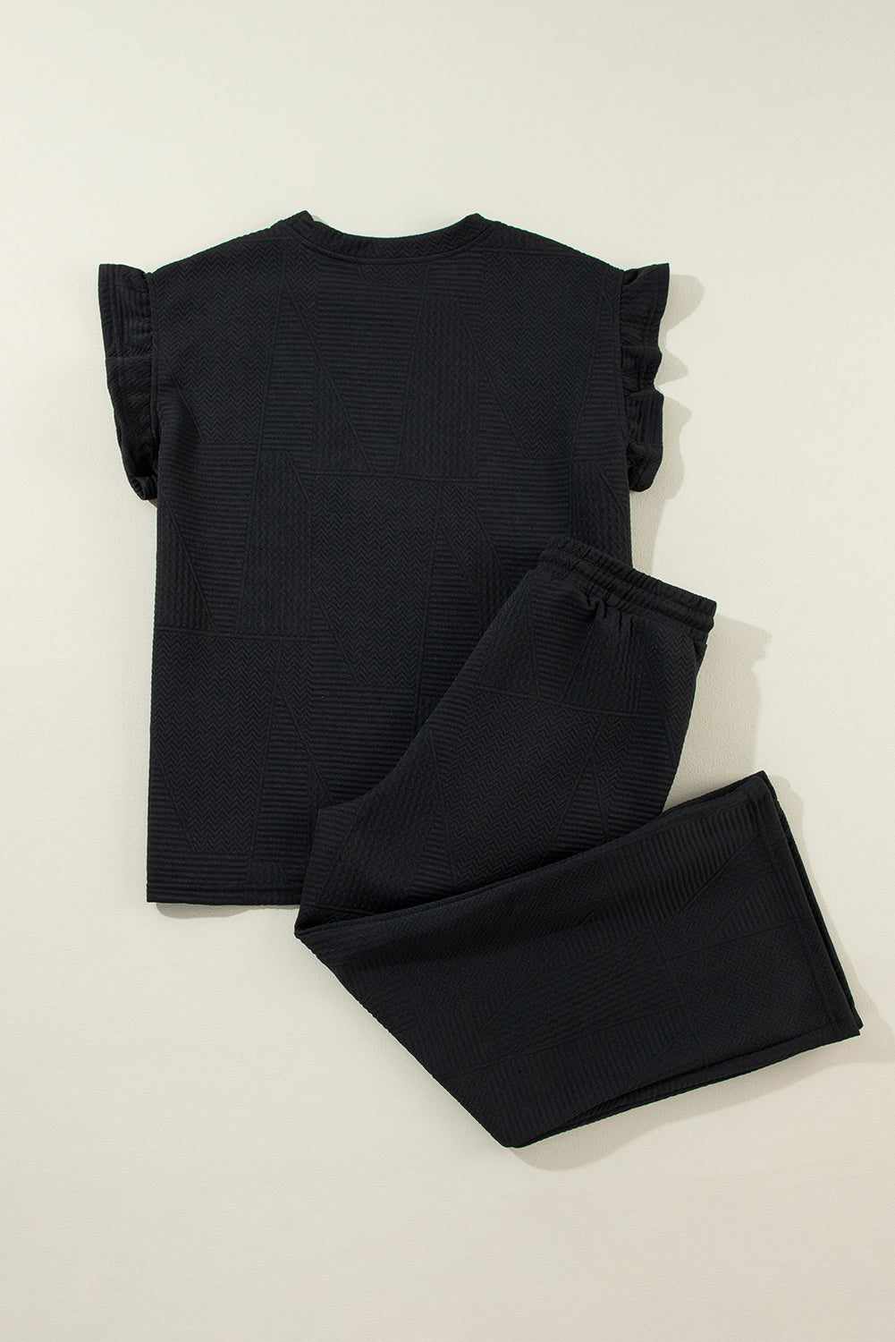 Set aus Oberteil und Hose mit Rüschen in Schwarz/Grün/Blau